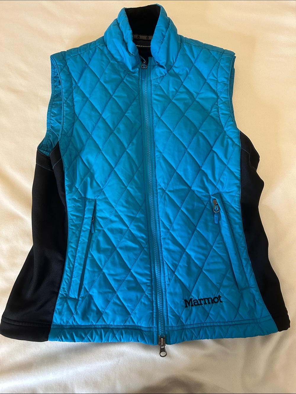 Marmot Turquoise Quilted Vest with Black Sides